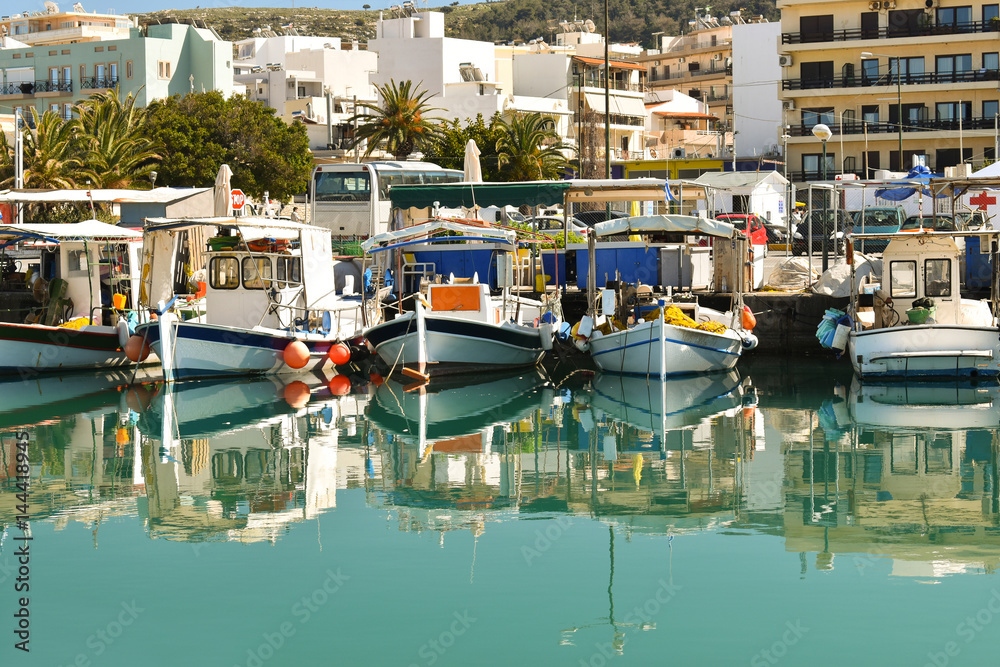 boats in the port on the background of city