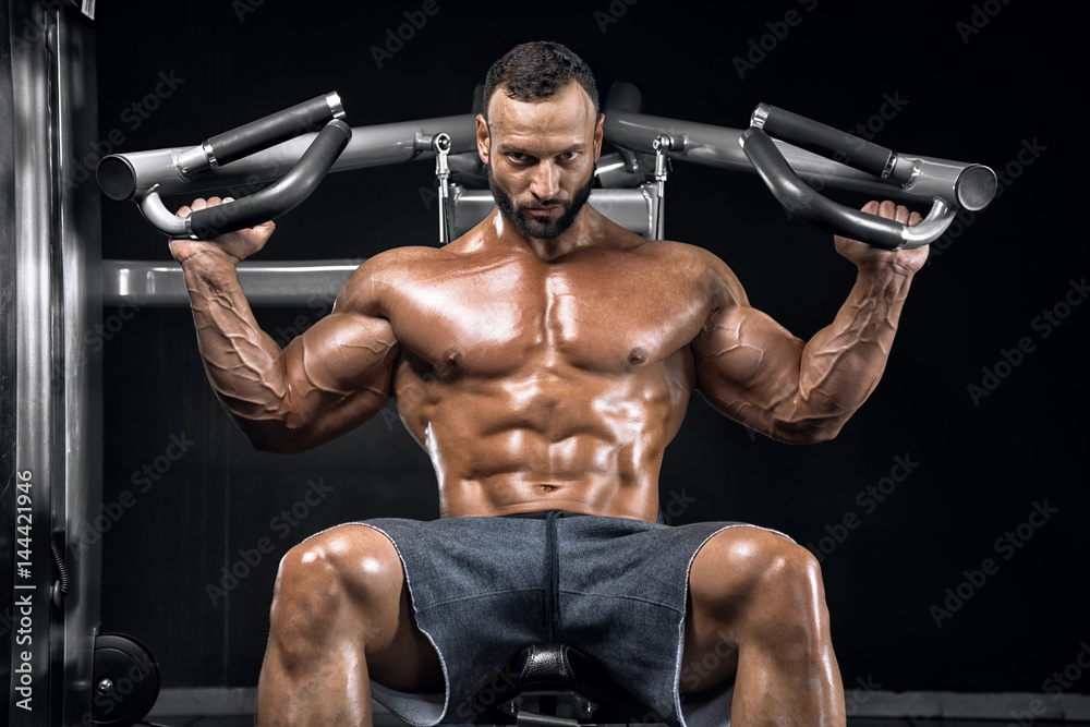 Bodybuilder in a posing gym.