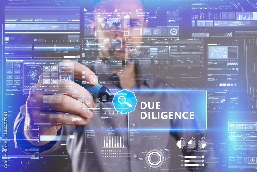 Business, Technology, Internet and network concept. Young businessman working on a virtual screen of the future and sees the inscription: Due diligence Business, Technology, Internet and network concept. Young businessman working on a virtual screen of the future and sees the inscription: Due diligence