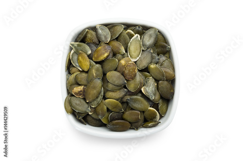 Roasted Pumpkin Seeds In White Bowl