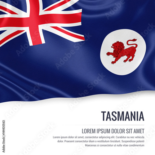 Flag of Australian state Tasmania waving on an isolated white background. State name and the text area for your message. photo