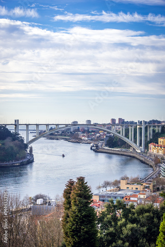 Arrabida Bridge connected Porto and Vila Nova de Gaia. View from Crystal Palace Park photo