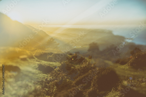 Abstract double exposure mountain sunset and nature concept - analog vintage look