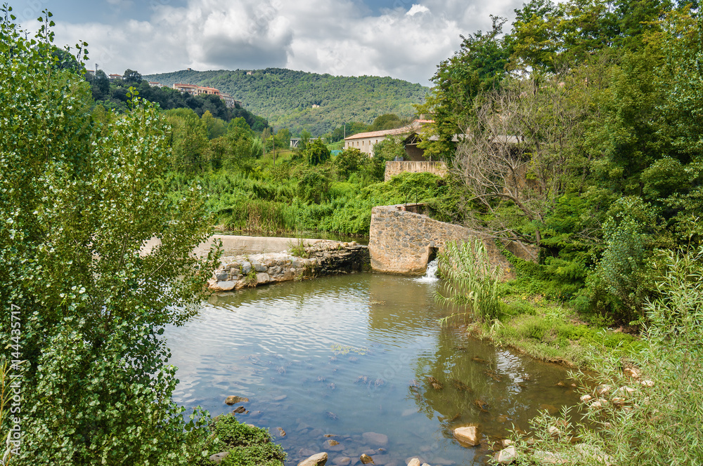 Cloudy view of Castelfollit de la Roca, La Garrotxa province, Catalonia, Spain. Cloudy view of Castelfollit de la Roca, La Garrotxa province, Catalonia, Spain.