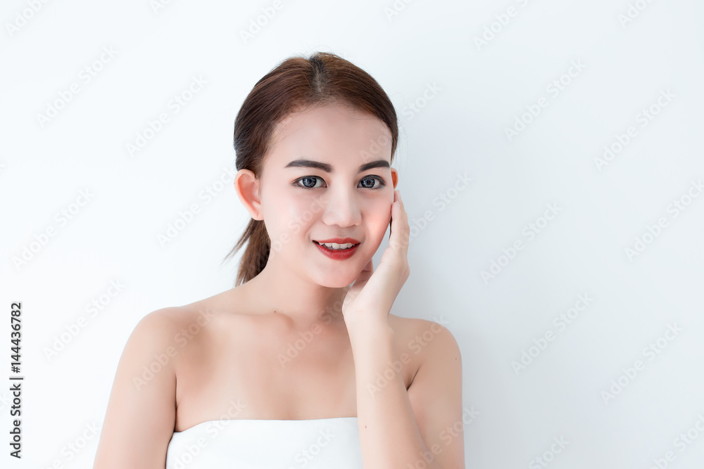 Closeup portrait of asian woman touching face skincare on white background Closeup portrait of asian woman touching face skincare on white background