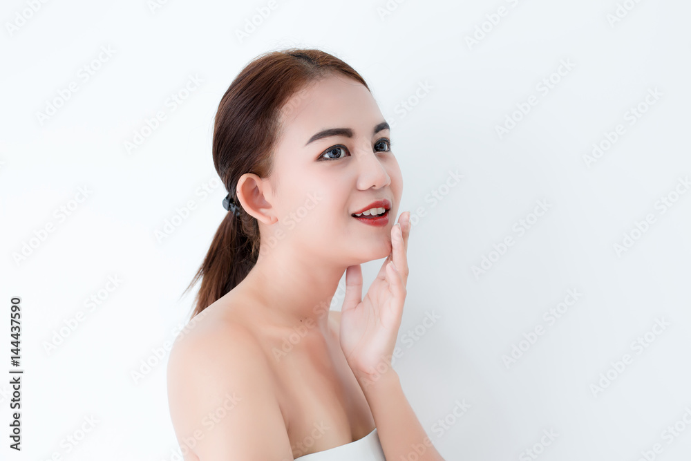 Closeup portrait of asian woman touching face skincare on white background Closeup portrait of asian woman touching face skincare on white background