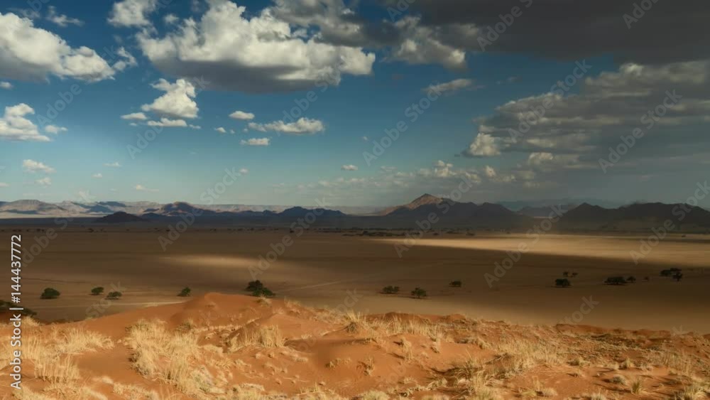 Time lapse - Moving clouds over the Elim dune, Sossusvlei, Namibia, Africa Time lapse - Moving clouds over the Elim dune, Sossusvlei, Namibia, Africa