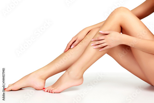 Woman legs on white background, isolated