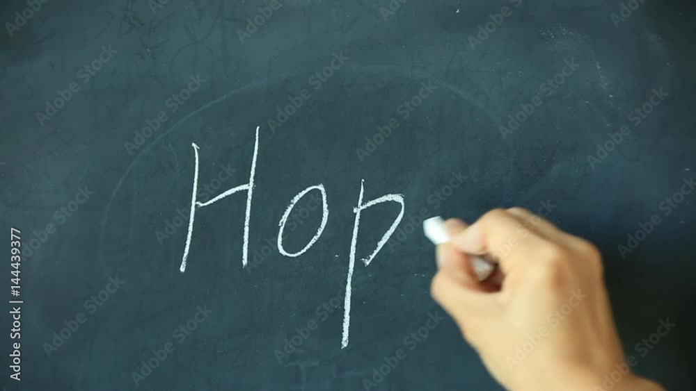 Chalk writing - Hope on chalkboard Chalk writing - Hope on chalkboard