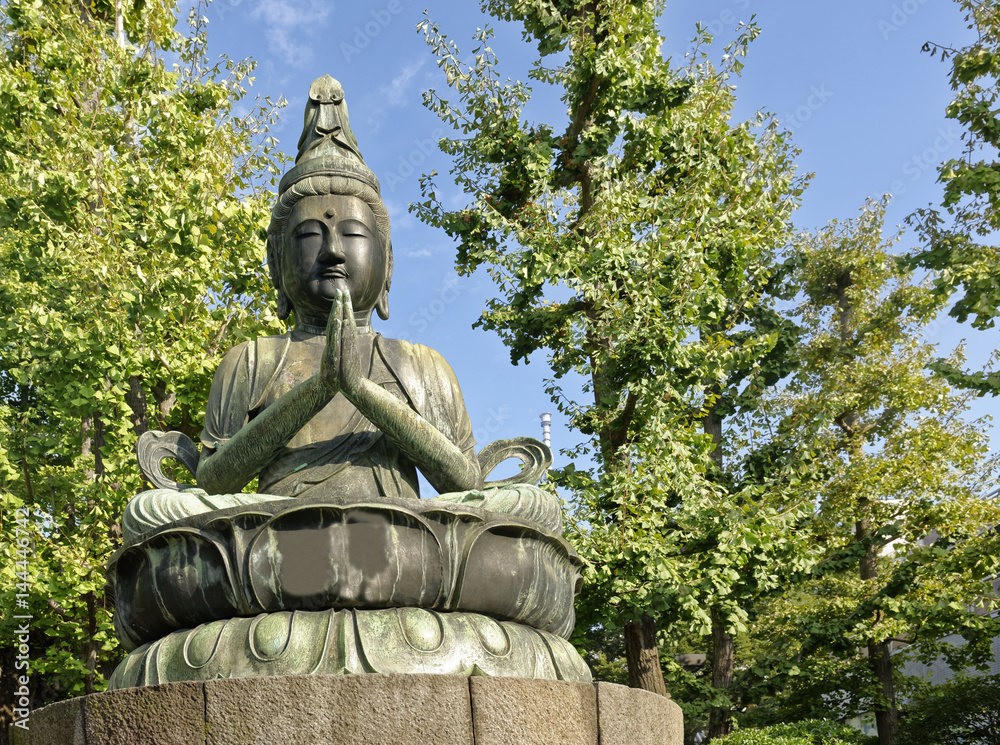 Buddha statue in the popular Asakusa Kannon Buddhist temple in Tokyo, Japan