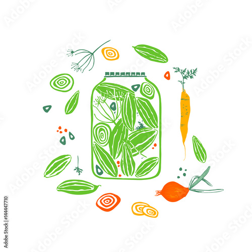 Pickled cucumbers. Isolated cucumbers, onions, garlic and dill in a glass jar.