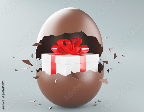 Uovo di cioccolato di Pasqua con pacco regalo 3d photo