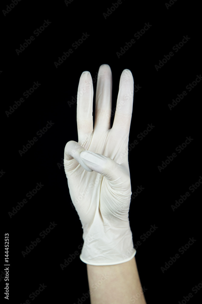 Obraz premium hand with white Glove on black