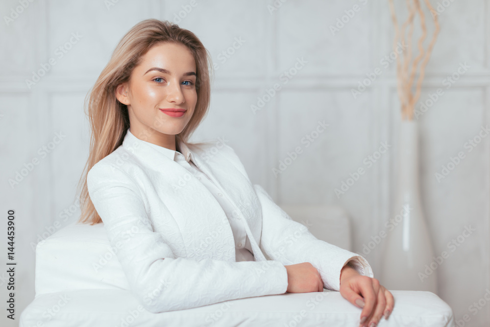 Portrait of beautiful young woman working in the office. Portrait of beautiful young woman working in the office.