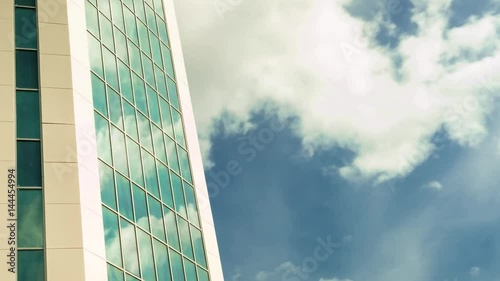 Low angle timelapse view of Skyscrapers in Frankfurt showing clouds moving overhead 4k