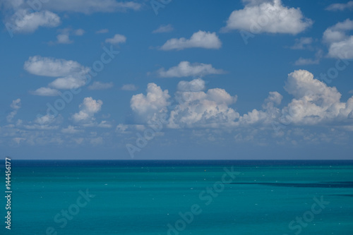 Tropical Ocean Landscape with Fluffy Clouds