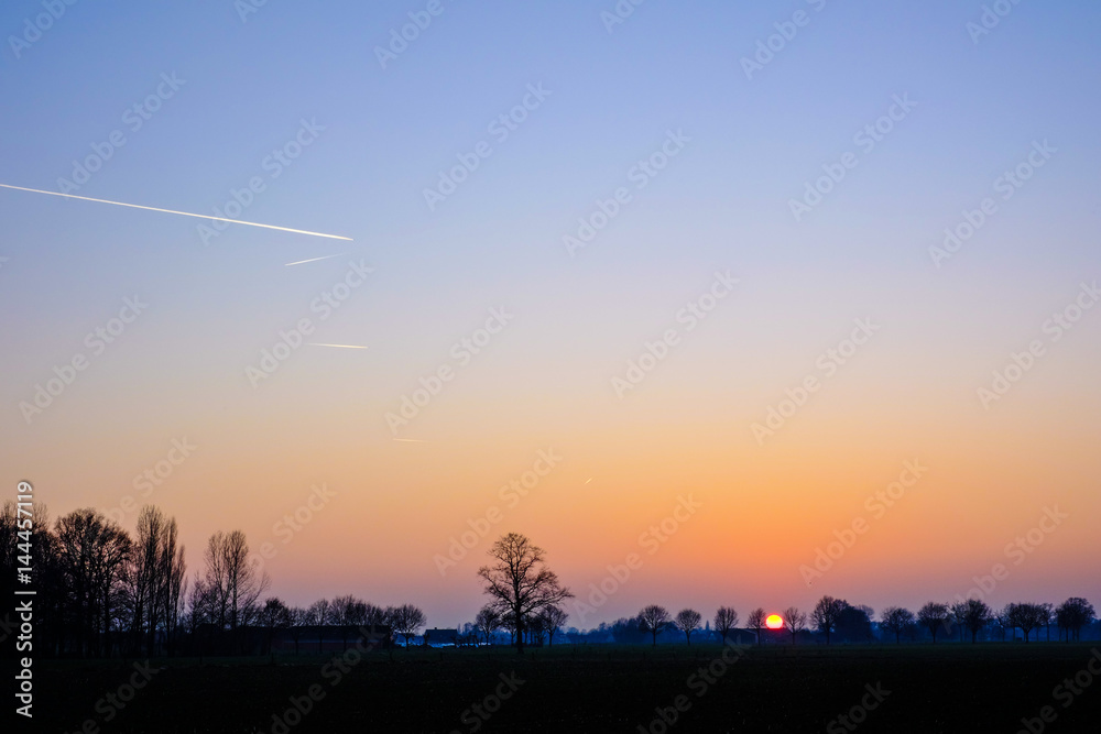 Naklejka premium Colorful countryside sunset