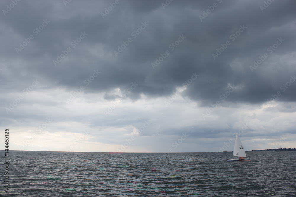 A Sailboat on the Stormy Sea