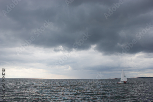 A Sailboat on the Stormy Sea