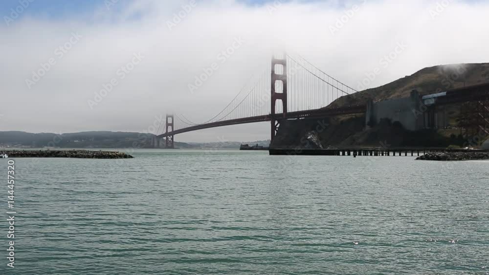 Panoramic of Golden Gate Bridge from Presidio Yacht Club, north shore, Horseshoe Bay, Sausalito, California, United States. Symbol of San Francisco. Travel and holidays concept. Panoramic of Golden Gate Bridge from Presidio Yacht Club, north shore, Horseshoe Bay, Sausalito, California, United States. Symbol of San Francisco. Travel and holidays concept.