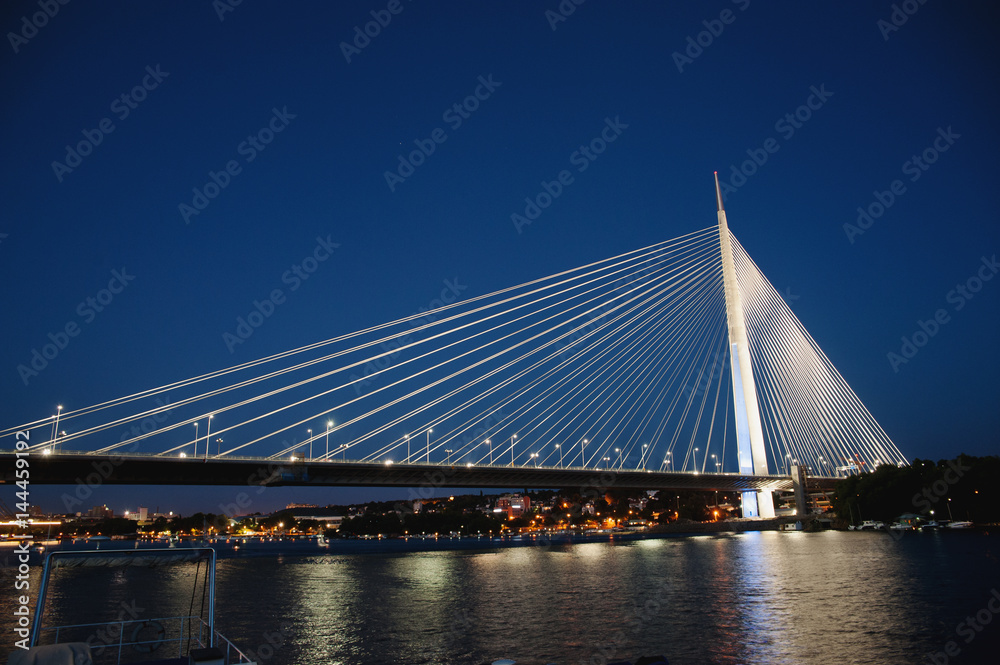 Abstract image - Suspension Bridge night lights. Dusk Skyline