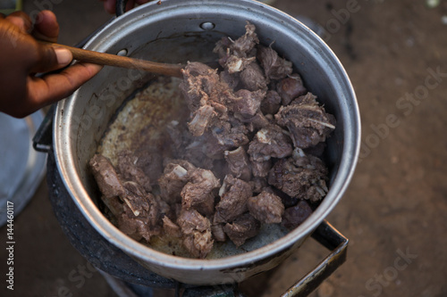 Preparing Goat Stew in a Malawian Village, Africa