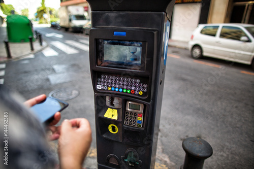 Fototapeta Naklejka Na Ścianę i Meble -  A parking payment machine closeup