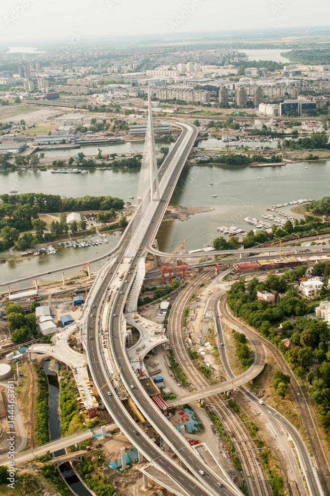 Skyline aerial view - city landscape - suspension bridge