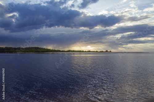 Latvia. Sunset on the river. Change in the weather. Elemental binge.