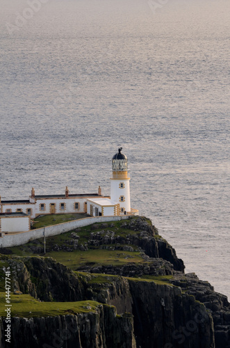 Lighthouse at Neist Point in Scotland During the Day photo