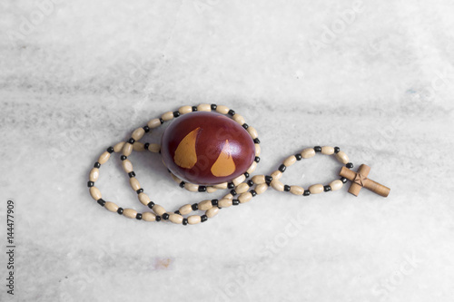 Easter egg and Rosary Beads