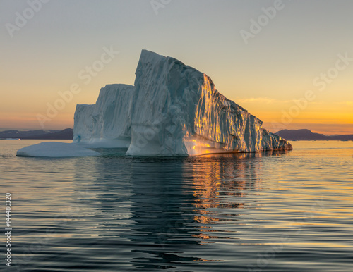 Iceberg in the Disco Bay, Greenland. Their source is by the Jakobshavn glacier. This is a consequence of the phenomenon of global warming and catastrophic thawing of ice photo