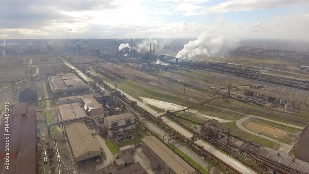 Aerial view of industrial steel plant. Aerial sleel factory. Flying over smoke steel plant pipes. Environmental pollution. Smoke. Aerial view of industrial steel plant. Aerial sleel factory. Flying over smoke steel plant pipes. Environmental pollution. Smoke.