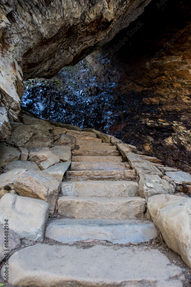 Low Angle of Stairs Through Arch Rock