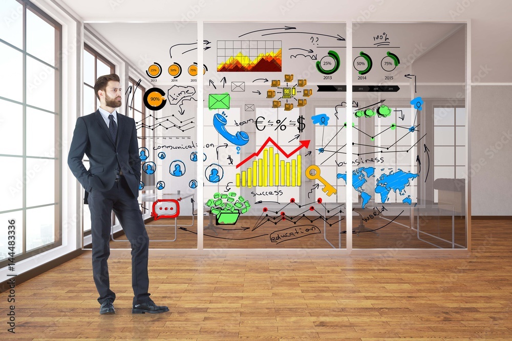 Thoughtful businessman in room with sketch Thoughtful businessman in room with sketch