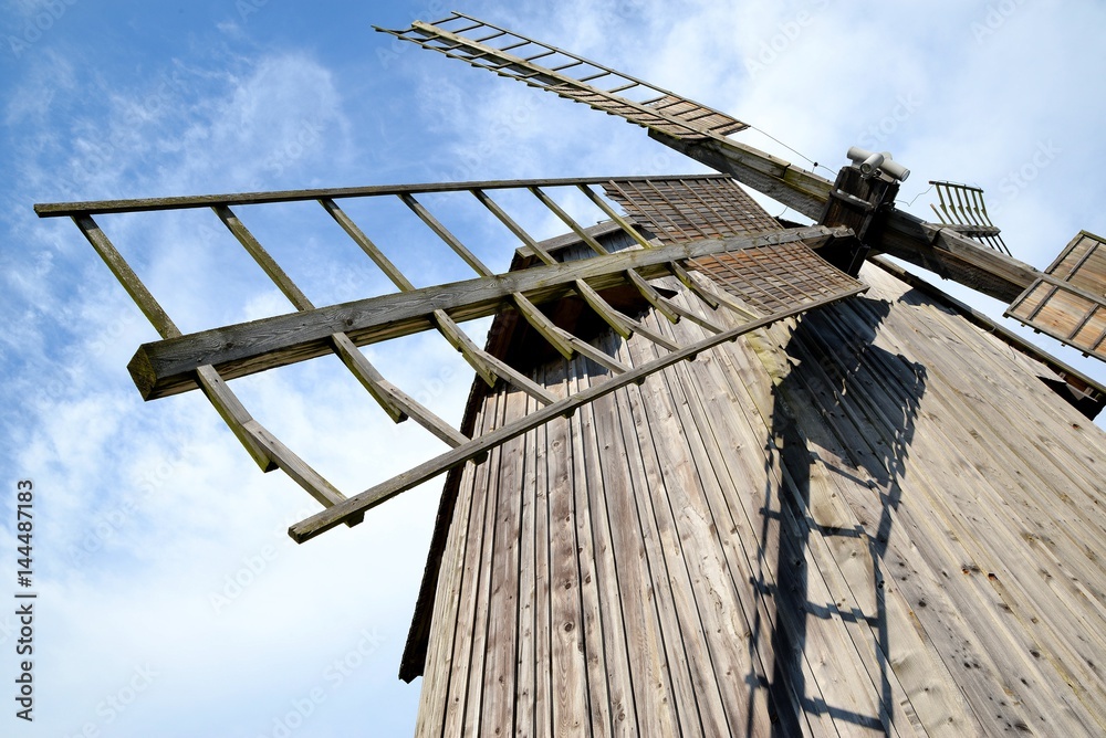 windmill wing mill grain against a blue sky
