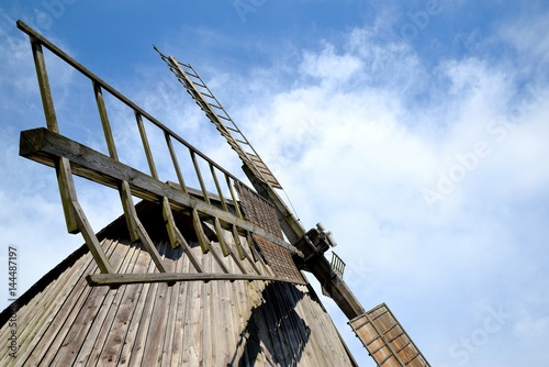 Obraz na płótnie windmill wing mill grain against a blue sky w salonie