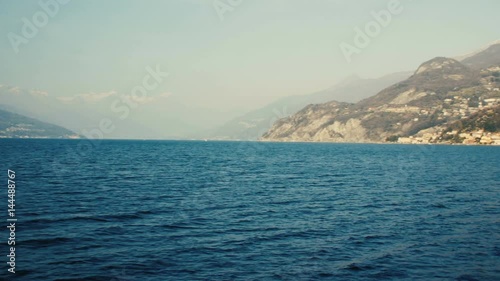 Panoramic view of Lake Como, the Alps above it and the nature around it. photo