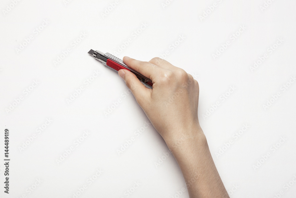 woman(female) hand hold a knife isolated white. woman(female) hand hold a knife isolated white.
