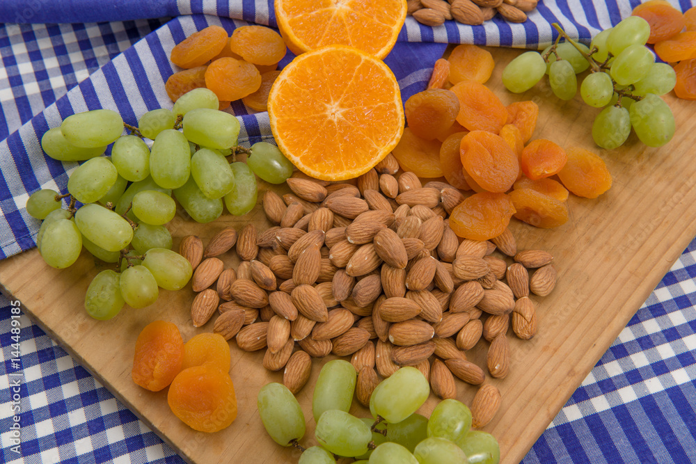 Healthy raw fruit and nut snack platter Healthy raw fruit and nut snack platter