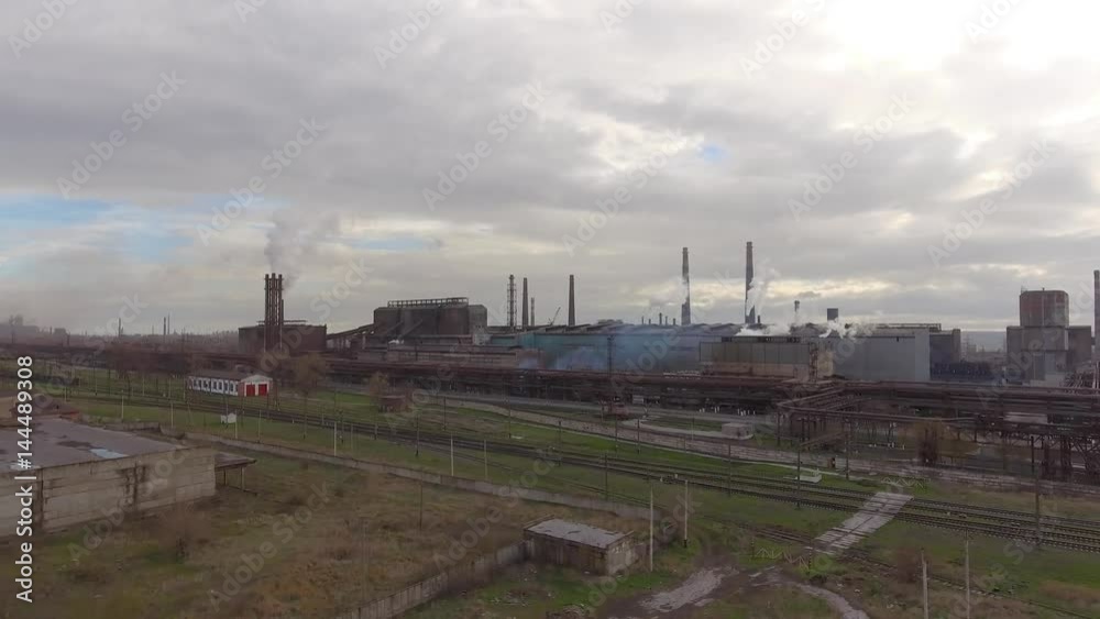 Aerial view of industrial steel plant. Aerial sleel factory. Flying over smoke steel plant pipes. Environmental pollution. Smoke. Aerial view of industrial steel plant. Aerial sleel factory. Flying over smoke steel plant pipes. Environmental pollution. Smoke.