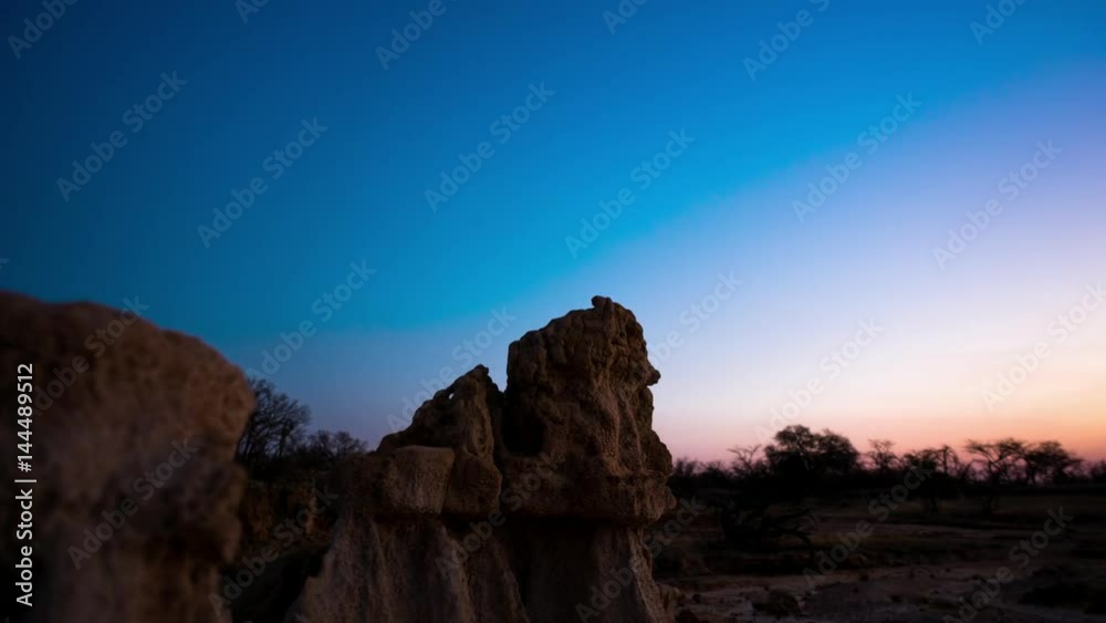 Linear, push-in holy grail timelapse of abstract landscape with eroded rocks while the sun is setting from day to night, while the Milky Way moves into the frame available on request. Linear, push-in holy grail timelapse of abstract landscape with eroded rocks while the sun is setting from day to night, while the Milky Way moves into the frame available on request.