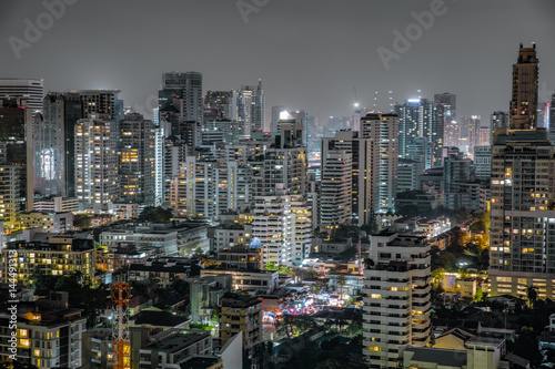 Bangkok, cityscape Many building. Cityscape background. The top of view on skyscraper. Urban life to show lighting on building at night. © joelia