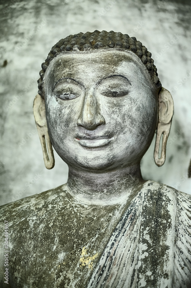 A Young Buddha With Earrings