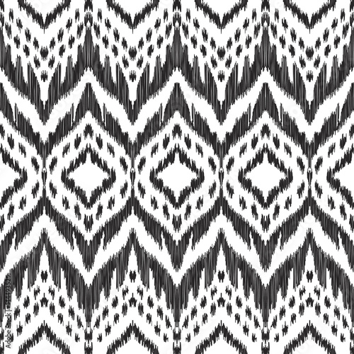 Vector Ikat seamless pattern. Navajo, aztec ornament. Creative hippies print. Black and white colored illustration. American ethnic backdrop.
