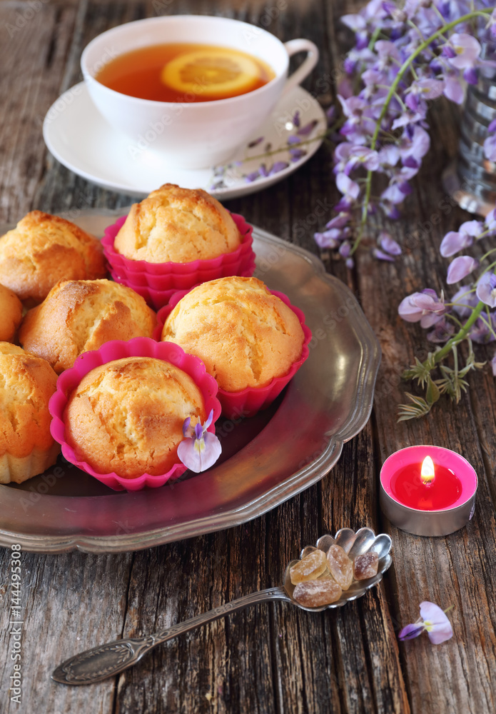 Lmon muffins, tea and blooming wisteria Lmon muffins, tea and blooming wisteria