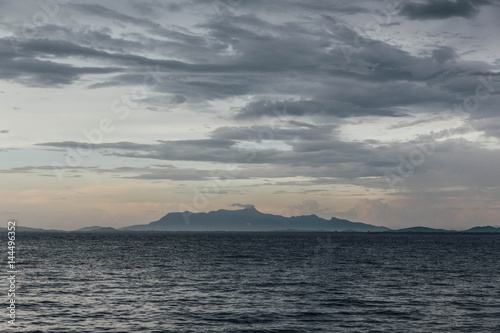 Seascape with Raining Cloud and Mountain at Dusk of George Town  Penang  Malaysia. 