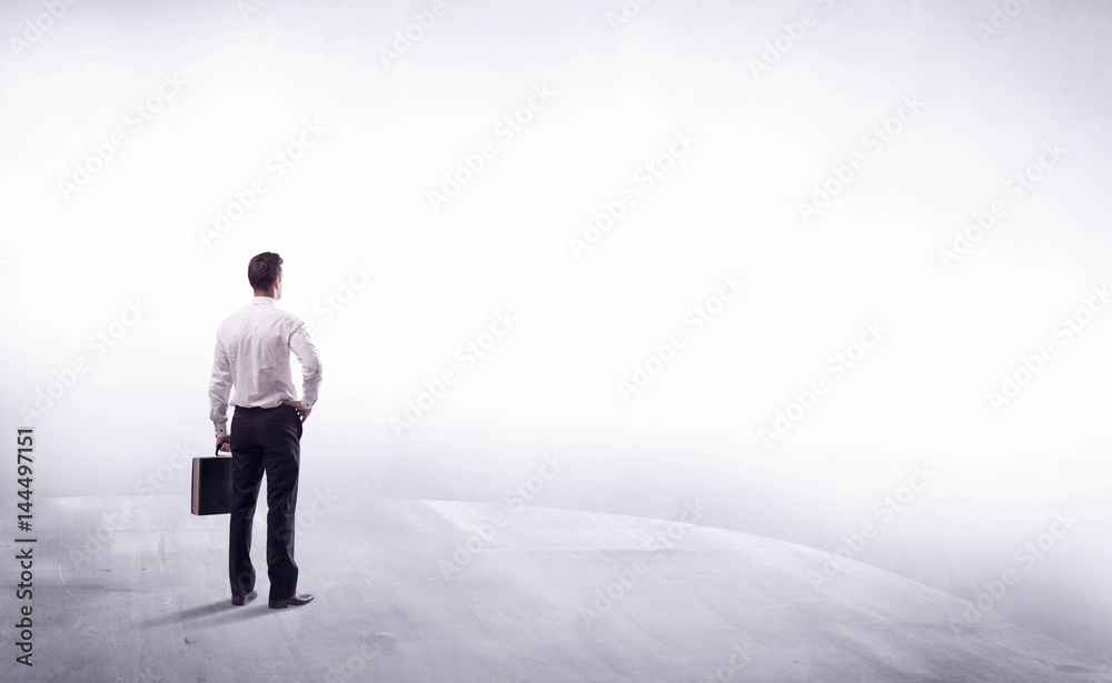 Business person standing from rear view Business person standing from rear view