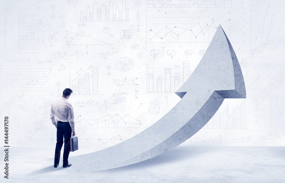 Obraz premium Financial businessman with arrow concept