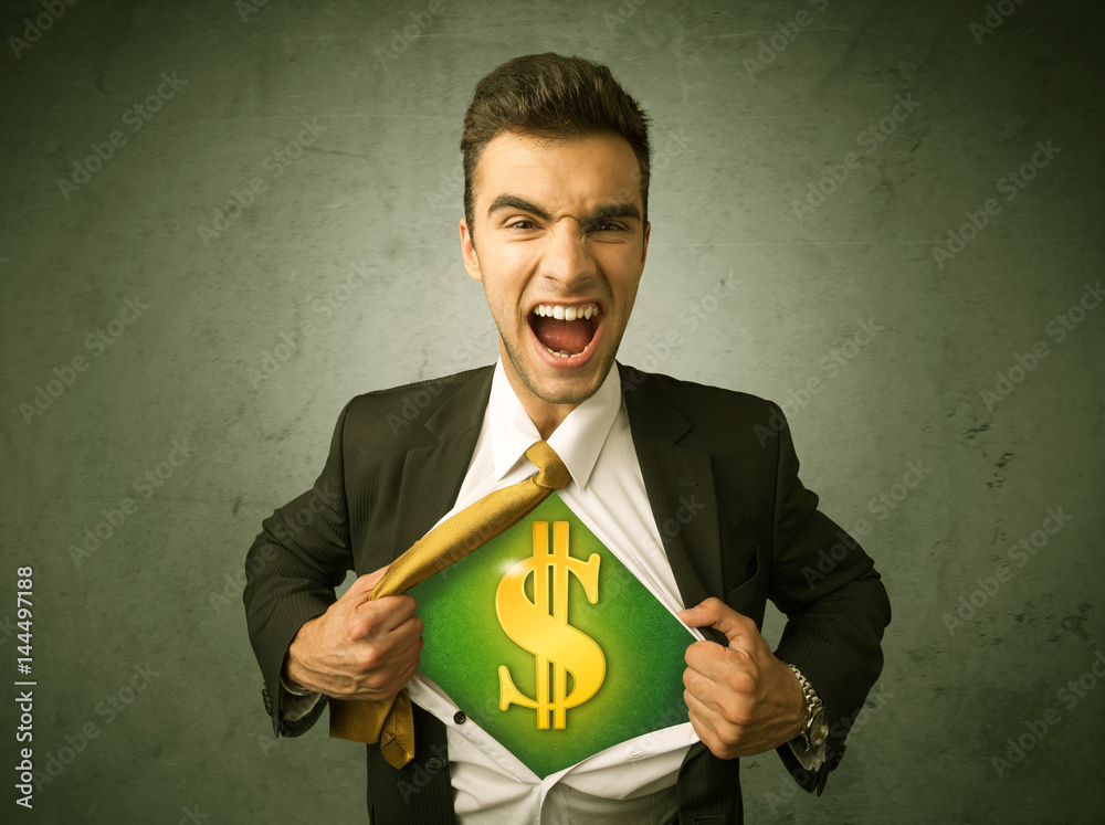 Businessman tearing off his shirt with dollar sign on chest Businessman tearing off his shirt with dollar sign on chest